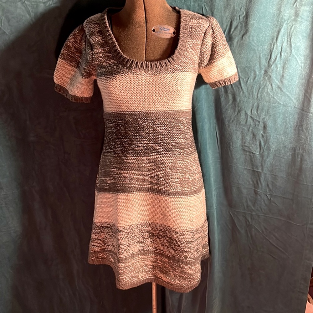 Small gray and white knitted sweater dress by “wear your ❤️ on your sleeve”